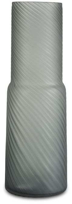 a large gray vase sitting on top of a white table