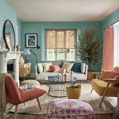 a living room filled with furniture and a fire place