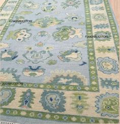 an area rug with different colors and patterns