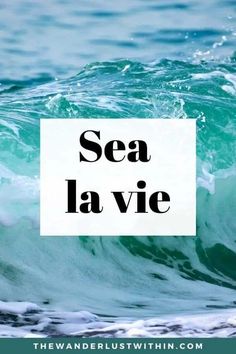 the words sea lavie are in front of an ocean wave