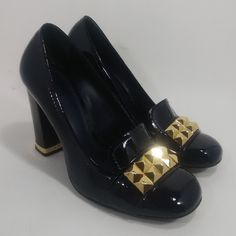 Tory Burch Limited Edition Patent Leather Studded Heels Size: 7m Gorgeous Navy Blue Patent Leather Body Square Toe Shiny Gold Studded Accents On Vamp Chunky 3.5" Stacked Heels With Gold Stripe Accent Cushioned Insoles! Like New Condition! Worn Only Once! Tory Burch Limited Edition Studded Collection! Originally Purchased From Tory Burch $325. Gorgeous! Dust Bag Included. Sorry No Box. Happy Poshing! Luxury Patent Leather Heels With Metal Feet, Luxury Heels With Metal Feet And Round Toe, Formal Patent Leather Heels With Metal Feet, Designer Patent Leather Court Shoes For Party, Designer Block Heel Gala Heels, Designer Block Heel Heels For Galas, Designer Block Heels For Galas, Designer Office Heels With Reinforced Heel, Studded Heels