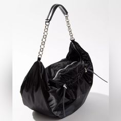 New Go-To Hobo Bag In Soft Nylon With Tech Detailing. Lightweight Unstructured Silhouette With A Zip Top And Interior Pocket. Finished With A Slinky Shoulder Chain. - 100% Nylon - Spot Clean - Imported - Dimensions: 17"L X 6.25"W X 10"H - Strap Drop: 12"L Color: Black Brand New Never Used Free Shipping On Bundles With 2 Or More Items! Hi! I’m A Fair And Honest Seller. I Sell All Of My Items On Multiple Platforms. Keep This In Mind For Items You Love! All Of My Items Are Brand New Never Used. All Black Nylon Hobo Bag For Everyday Use, Everyday Black Nylon Hobo Bag, Black Nylon Hobo Bag Shaped As A Tote, Black Nylon Hobo Shoulder Bag, Black Nylon Hobo Bag For Daily Use, Evening Nylon Tote Shoulder Bag, Black Nylon Hobo Bag With Adjustable Strap, Trendy Evening Nylon Shoulder Bag, Versatile Nylon Shoulder Bag For Errands