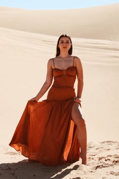 Details Removable straps Adjustable straps Smocked Side slit Bust cut out Care 100% Rayon Model's Measurements Model is 5'6" Is wearing a size Medium Rust Maxi Dress, Outfit Goals, Ootd Fashion, Spring Outfit, Red Formal Dress, Fashion Boutique, Cognac, Smocking, Spring Fashion