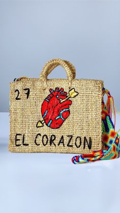 Handmade of henequen and beautifully embellished by artisans in Mexico these bags are a must have for the summer or for a unique gift and special occasion . Picture bag size is 9.5 inches some color variation may come in handbags different then pictures.   Small bag dimensions  Material: Henequen. Height: 9.5 inches Width: 12 inches Depth: 5 inches Medium bag dimensions Material: Henequen. Height: 12 inches Width: 14 inches Depth: 5 inches embroidered straps to be used shoulder or crossbody. var Welcome Gifts Mexico, Mexican Made Purse, Handmade Mexican Gifts, Artisan Embroidered Beach Bag, Handmade Straw Tote Bag For Festivals, Unique Handwoven Rectangular Bags, Artisan Multicolor Straw Bag As Gift, Artisan Multicolor Straw Bag For Gift, Embroidered Bags For Summer Gifts