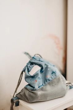 a purse sitting on top of a white table