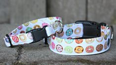 a white dog collar with colorful donuts on it's front and back sides