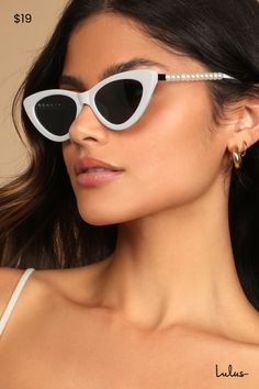 Put a little extra pep in your step with the Lulus Pep Talk White Mini Cat-Eye Pearl Sunglasses! These sleek little cat-eye sunglasses have shiny white frames, and tinted black lenses. Shiny white faux pearls and gold accent the arms, for added glam factor! Frames Measure 5. 75" Wide. Arms Measure 5. 5" Long. Man Made Materials. Imported. Lulus | Pep Talk White Mini Cat-Eye Pearl Sunglasses. White Cat Eye Sunglasses Outfit, Jackie O Halloween Costume, White Sunglasses Outfit, Cat Eye Sunglasses Outfit, White Cat Eye Sunglasses, Pearl Sunglasses, Cat Eye Sunnies, Mini Cat, Sunglasses Outfit