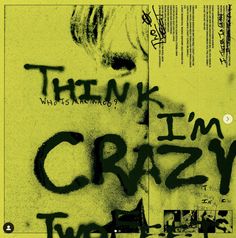 graffiti written on the side of a yellow wall in front of a green sign that says, think i'm crazy