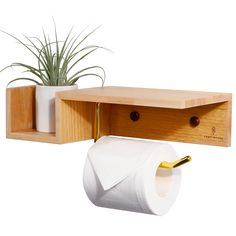 a toilet paper holder with two rolls of toilet paper hanging from it's sides