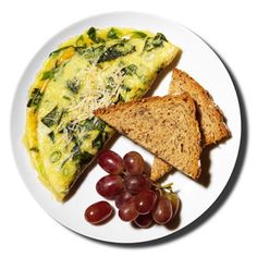 an omelet and toast on a white plate