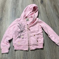 New With Tags True Religion Hooded Sweatshirt -Super Soft And Warm Sweatshirt -Light Pink With Black Fairy, Butterflies, And Flower Scene -Branded Brass Decorative Stud Details -White Contrast Stitching -Front Pockets -95% Cotton, 5% Spandex *****Please Note****** -Zip Up However Manufacturer Error Includes A Zipping Error. It Does Not Zip Down All The Way And Will Stop. Can Be Worn And Dealt With As Is Or Can Be Repaired Or Replaced. Size Youth Medium Total Length 18.5” Pit To Pit 15” Outfit Chart, Bf Clothes, Latina Outfits, Black Fairy, Vintage Tee Shirts, Zip Up Hoodies, Knitted Blankets, Dream Clothes, True Religion