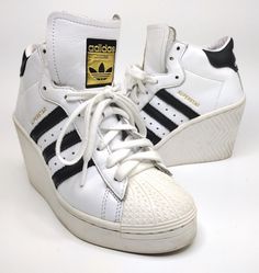 Adidas Women’s Superstar Ellure Wedge Shoes Size 5 White Black Off White FW0102. Condition is Pre-owned. Ships USPS Mail Package. Platform Wedge Sneakers For Streetwear, Streetwear Wedge Sneakers With Platform, White Wedge Sneakers For Streetwear, Sporty Wedge Sneakers For Streetwear, Adidas Platform Sneakers With Round Toe, Mail Package, Button Shirts Men, Wedge Sneakers, White Accents