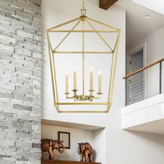 a light fixture hanging from the ceiling in a living room