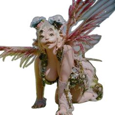 a woman dressed as a fairy with wings