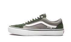 The Vans Old Skool Pro is an authentic skateboarding shoe that's also great for lifestyle wear.  The low-profile sneaker features a sturdy suede and canvas upper—forest green on the suede and grey on the canvas.  Bright white contrasting appears on the Vans Sidestripe, top eyelet, laces, and stitching.  The vulcanized midsole also contrasts in white.  Underneath is a rubber waffle outsole with excellent traction that grips the streets or the board.  The ‘Pro’ version of the Old Skool is designed Vans Old Skool Gray, Thrasher Magazine, Stadium Goods, Vans Shop, Mens Vans, Vans Old Skool, Womens Vans