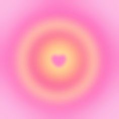 an abstract pink and yellow background with a circular design in the center, which is very blurry