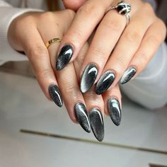 Click to see more.

50 Stunning Cat Eye Nail Designs to Captivate Any Crowd Black Nail Short Simple, Black Nails Cateye, Black Cat Eye Almond Nails, Nails Dark Colors Designs, Black Eye Nails, Black Cat Eyes Nail, Kat Eyes Nails, Short Black Cat Eye Nails, Cat Eye Dark Nails