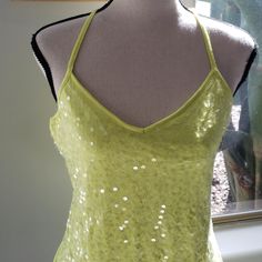 Bright Yellow With Clear Sequins. Racerback Spaghetti Straps. Top Has Shelf Tank Underneath. Summer Sequined Backless Halter Top, Sequined Backless Halter Top For Summer, Backless Sequined Halter Top For Summer, Green Backless Tank Top For Summer, Backless Tank Top For Spring Party, Summer Party Camisole Tank Top, Green Backless Tank Top For Party, Spring Party Halter Top With Spaghetti Straps, Party Racerback Halter Top