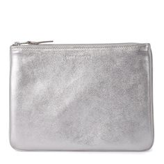 Comme des Gar?ons Wallet silver leather pochette. Zip fastening. Dimensions: 21 x 15 cm. Classic Silver Wallet For Formal Occasions, Designer Silver Wallet With Card Slots, Luxury Silver Clutch With Removable Pouch, Evening Silver Leather Wallets, Silver Leather Evening Wallets, Elegant Clutch Bag With Flat Pocket, Modern Silver Rectangular Wallet, Silver Clutch With Removable Pouch, Formal Clutch Pouch With Card Slots