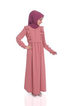 Child Hijab Dress Duru Model Color: Powder Fabric Feature: It is made of Ayrobin (cotton) fabric. It can be used in 4 seasons. Product Features : Our children's hijab dress is produced with ayrobin fabric. The front is decorated with buttons and frills. It has a hidden zipper on the back. Portable belt is available. The sleeves are rubber. Note: This product is Powder in color. If you are looking for a different color, visit our Etys store. https://www.etsy.com/shop/MevlanaKidsAbaya The molds of Eid Long Sleeve Ruffled Dresses, Muslim Fashion Dress Simple, Abaya Girl, Khimar Niqab, Kids Abaya, Kids Kaftan, Eid Dress, Dubai Abaya, Muslim Kids