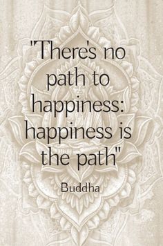 buddha quote on happiness and happiness with lotus flower in the center, there's no path to happiness