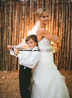 a young boy and woman posing for a photo