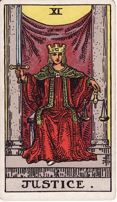 a tarot card with the queen of swords