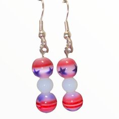 These Hand Crafted Stars And Stripes Earrings Are Essential For Celebrating The Summer Holiday! Red, White & Blue Cat’s Eye Beaded Statement Earrings. White Beads Sit Between Starred And Striped Cat’s Eye Beads. Silver Metal Fish Hook Findings Round, Glass Beads Ideal For Anyone With Pierced Ears. Matching Bracelet Available Separately Perfect For The Birthdays, Anniversaries, 4th Of July, Memorial Day And Other Occasions. Visit My Boutique To Find Other Unique Pieces Of Hand Made Jewelry. Bundl Cottagecore Jewelry, Hot Pink Flowers, Metal Fish, Striped Cat, Holiday Essentials, Handcrafted Bracelets, Blue Cat, Earring Holder, Made Jewelry