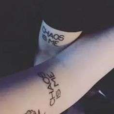 two people with matching tattoos on their arms and wrist, both have words written on them