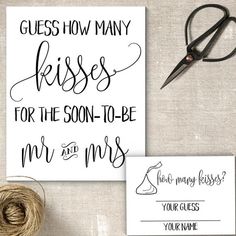 a pair of scissors next to a card with the words guess how many kisses for the son - to - be mr and mrs