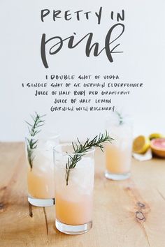 three glasses filled with lemonade and rosemary garnish on top of a wooden table