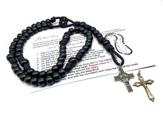 Lutheran Paracord Rosary  This beautiful handmade Tough Rosary Features High Quality smooth acrylic round beads.  They are strung on high quality 550 paracord to obtain tough maximum durability, and flexibility. This Tough 550 Paracord Rosary is a traditional Five Decade Rosary, consisting of a total of 59 beads and knots. The  cross or Crucifix is made of base metal with a silver tone finish. The Workmanship put in to create the piece is that of high quality and will last for many years to come Adjustable Rosary With Large Beads As Gift, Adjustable Large Beads Rosary As Gift, Adjustable 8mm Beads For Jewelry Making, Adjustable Round Spiritual Rosary, Adjustable Spiritual Rosary, Paracord Rosary, Decade Rosary, Jesus Prayer, 550 Paracord