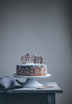 a cake sitting on top of a wooden table