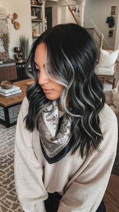 Elevate your black hair with modern elegance using silver and gray highlights. This dynamic blend is perfect for creating a polished, eye-catching style. #ModernElegance #SilverGrayHighlights #BlackHairGoals #SophisticatedStyle Black With Ash Grey Highlights, Jet Black Hair With White Streak, Grey Balyage Long, Grey Hair Peekaboo, Icy Black Hair, Black Hair Frosted Tips, Black Hair Blonde Lowlights, Dark Hair With Grey Money Piece, Silver Streaks In Black Hair