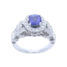 a blue and white diamond ring