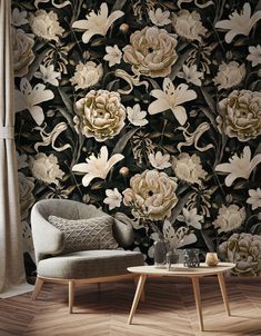 a chair and table in front of a wallpapered with white flowers on it