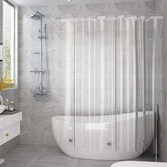 a bathroom with a tub, sink and shower curtain