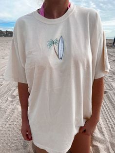 Vanilla Surfboard Tee – Sunkissedcoconut Outer Banks Shirt, Luxury Paints, Swimwear Sets, Embroidered Sweatshirts, Summer Tshirts, Surfboard, Cool Shirts, Vanilla, To Create