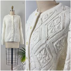 "1960's Diamond Knit Pointelle Cardigan Sweater * open weave pointelle knit with diamond pattern * ribbed crewneck * ribbed, scalloped hem and cuffs * creamy ivory pearlescent buttons Label-Wintuk Circa-60s Material-100% orlon acrylic Condition-excellent like new condition women's size-XS-S. depending on desired fit.  shown on a size XS dress form 33-25-35 Shoulders 16\" Bust 38\" Sleeve length (shoulder to cuff) 22\" length (top of shoulder to hem) 23\" Measurements: All measurements are taken with the garment laying flat, doubled for the bust, waist and hips make. Please sure you leave yourself a little wiggle room for a comfortable fit! *all items are vintage and pre-loved.  All major flaws are noted but may include slight imperfections as part of their past life.  blemishes like loose Button Front Sweater, Pointelle Cardigan, Pointelle Knit, Open Weave, Dress Form, Scalloped Hem, Vintage 60s, Jumpers And Cardigans, Diamond Pattern