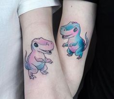 two tattoos with dinosaurs on their arms