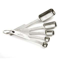 six stainless steel kitchen utensils with handles