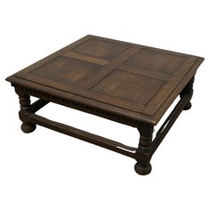 a square wooden table with four legs