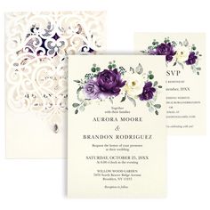 the wedding card is decorated with purple flowers and greenery, along with an ornate laser cut