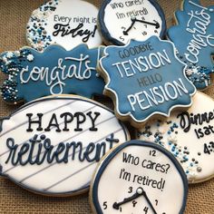 decorated cookies that say congratulations, tison, and happy retirement with words on them