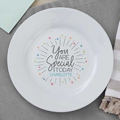 a white plate with the words you are special today written on it next to a napkin