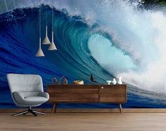 an ocean wave crashing into the shore wall mural