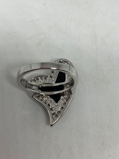 Vintage black onyx white sapphire ring 925 Sterling Silver Setting Size 6 Can be resized, my jeweler charges $10-$20 All rings are shipped free in the US in a nice gift box. Check out our over a THOUSAND great reviews Engraving is $4 per letter and is not always perfect depending on the piece. It can take a few days if the jeweler is busy. This is payable to Paypal Judithsltd@gmail.com Silver Cocktail, White Sapphire Ring, Clear White, Earrings Photo, White Sapphire, Cocktail Ring, Cocktail Rings, Black Onyx, 925 Sterling Silver Ring