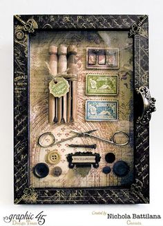 a shadow box with various items in it that include scissors, buttons and other things