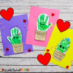 three valentine's day cards with handprinted cactus and heart shapes on them