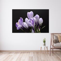 purple flowers in the middle of a room